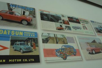 The Heritage Corridor houses a small Nissan photo and plastic model museum. You can find some familiar names on the wall, like DATSUN or Prince.