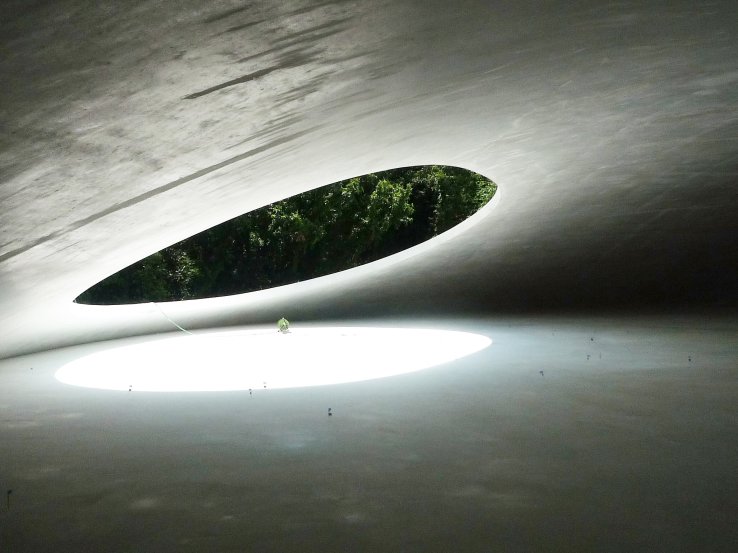 The uniquely designed Teshima Art Museum fuses art, architecture, and the natural environment