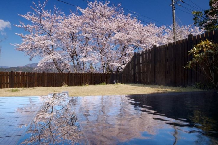 The open-air bath at Auberge Uchiko affords some of the best views of the town.