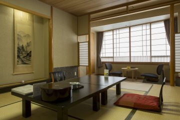 One of the smaller rooms has beautiful Nihon-ga painting on the wall at Hotel Ravie Kawaryo near Ito Station