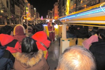 Passengers lining up to board the Tombori River Cruise boat