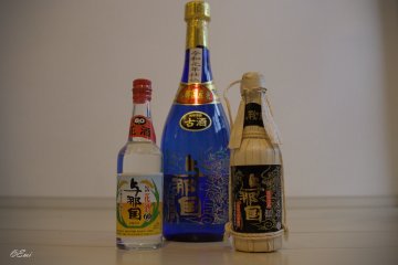 At 120 proof, Hanasake is the strongest alcoholic beverage in Japan. The bottle at right is wrapped in Kuba leaves to protect it from breakage during shipping.