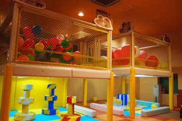 Next to the ball pit are more kids' stations; who can say no to balloons and spinning cushions?