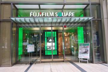 Fujifilm Square's green futuristic entrance is hard to miss in the Tokyo Midtown.