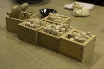 A selection of small stamps and tool to add engravings