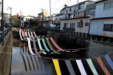 <p>Kimono silk draped for 100 meters along the Miyosoji River (2013)</p>