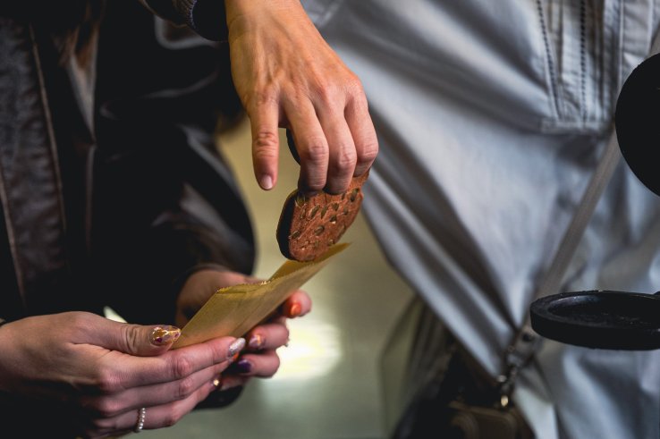 Pumpkin-flavored, cookie-type senbei fresh off the mold
