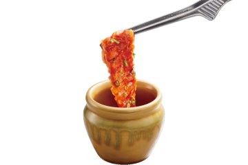 Pot marinated pork belly kalbi with original Haisai sauce (649 JPY including tax), a sweet and slightly spicy dish that showcases Okinawa's love of pork