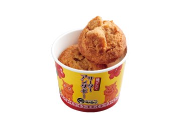 Freshly fried sata andagi (209 JPY including tax), a local doughnut that is crisp on the outside and soft inside