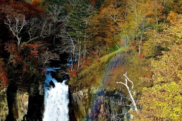 Rainbow appearing over the falls
