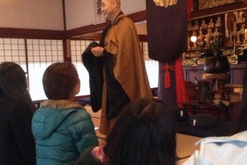 The temple's caretaker greets visitors and will explain the history of the temple as well as instructions for zazen meditation.