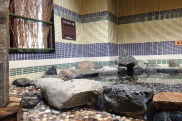 Outdoor baths on the the top floor of the hotel