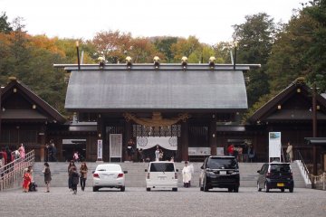 Cars parked at the entrance of the temple were first blessed by a ritual done by the priest.
