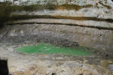 Ridges in the rock face caused by changes in the water level over the millenia.