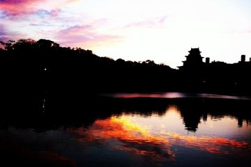 <p>Sunset view - reflection on moat</p>