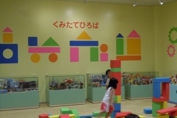 Here, kids build things out of large, soft, colorful blocks