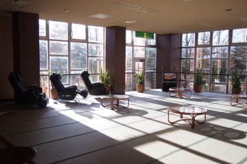The spacious, light-filled relaxation area of the onsen.