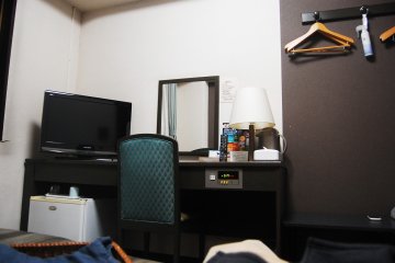 View of desk and TV in room