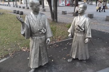 Two more samurai discuss the ramifications of a minister's recent assassination
