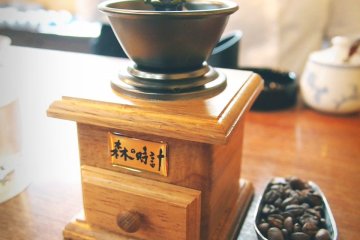 You are required to ground your own coffee using this nifty mini coffee grinder that works in a clockwise direction.