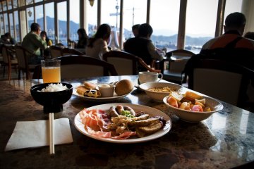 Having breakfast at the Excelsior restaurant overlooking the bay