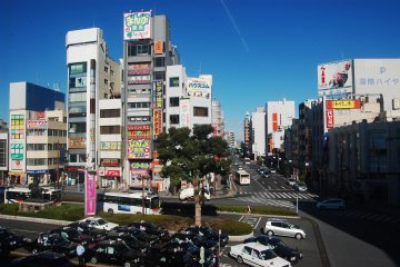 View outside the station, shows the business district of Kumagaya city