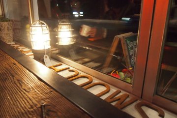 I sat there watching the day turn to night, watching the people of Sapporo pass me by.