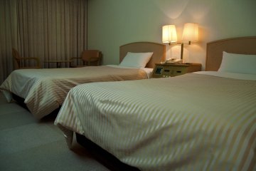 A wide view of the room with the seating area in the background