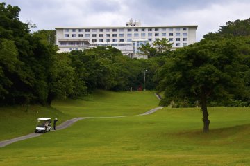 People enjoying their passion for golf in the surroundings of the hotel.