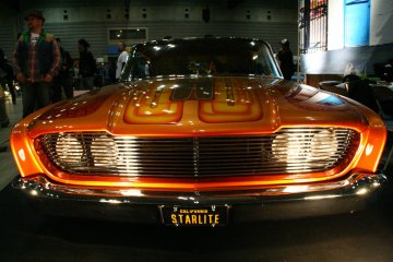 <p>Stance and style: 1960 Ford Starliner "Agent Orange" from Starlite Rod &amp; Kustom, California</p>