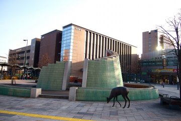 An emerald structure that is color-coordinated with the interior of the station
