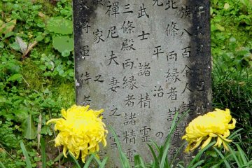 Flowers and gravestone.