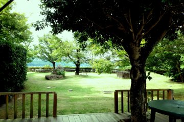 A mature strolling garden overlooking the hills over Kumamoto
