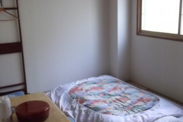 <p>My room with the futon laid out</p>