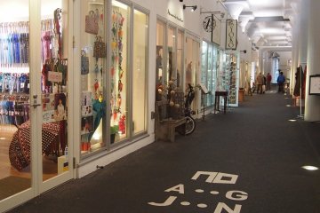 <p>Signs on the floor look as cryptic as its name, but is simply the shop guide using letters.&nbsp;</p>
