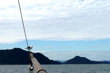 <p>Kumamoto Utase historical boat in full sail off Amakusa Islands</p>