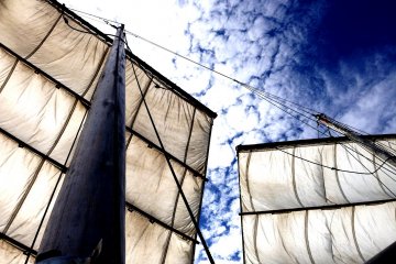 <p>The Kumamoto Utase historical boat in full sail off the Amakusa Islands</p>