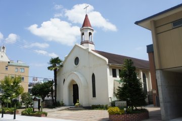 <p>Kobe Baptist Church view on a bright sunny day on the Yamate Street</p>