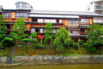 <p>The dormitory's sunroom is the second floor room with the open door</p>