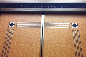<p>Retro looking elevators at Karasuma Kyoto Hotel Next to Hankyu and Subway Stations</p>