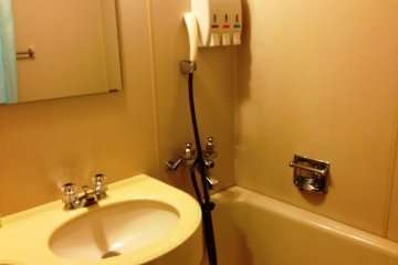 <p>The compact but functional bathroom at Karasuma Kyoto Hotel's Standard and Superior rooms are similar in size to those found in a business hotel.</p>