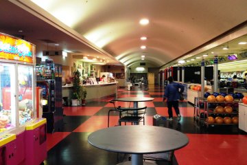 The red and black floor tiles have a retro look like some 1950's milk bar