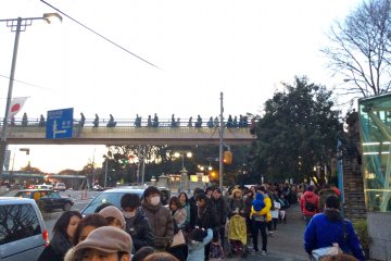 A quick picture of the long line of patient, Garrett Popcorn Shops customers in Harajuku.