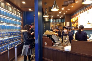 Entering Garrett Popcorn Shops in Harajuku.