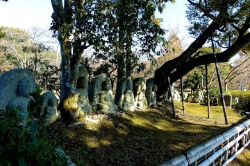 <p>Old stone statues along the path</p>