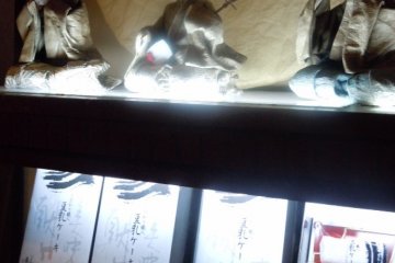 <p>Japanese dolls made from paper, displayed near the reception area</p>