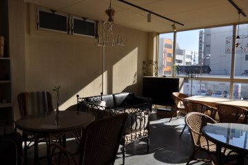 <p>Sunny upstairs dining area</p>
