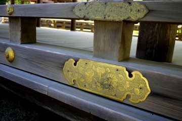 Decorative brass plates protect joints in the wood from attacking insects.
