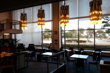 <p>The lounge opposite the lobby features views, pay massage chairs, and a 3000 comic/manga library.</p>