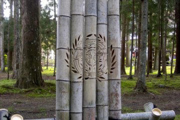 Date Masumune's family crest carved into a bamboo sign.